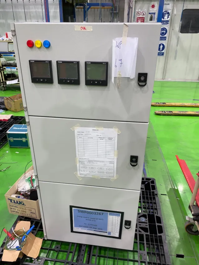 Electrical control cabinet with indicator lamps and display