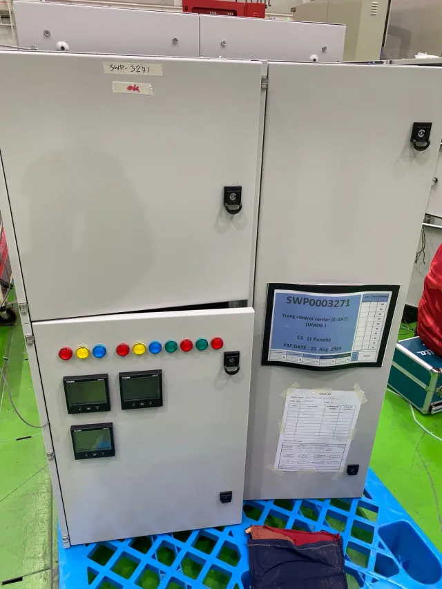 Control cabinet with meters and illuminated indicator lamps